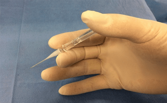 Syringe style of needle handling (image)
